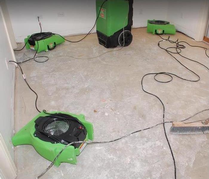 SERVPRO drying equipment being used in water damage room