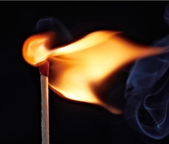 Closeup of match burning