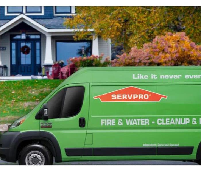 SERVPRO restoration vehicle in front of home